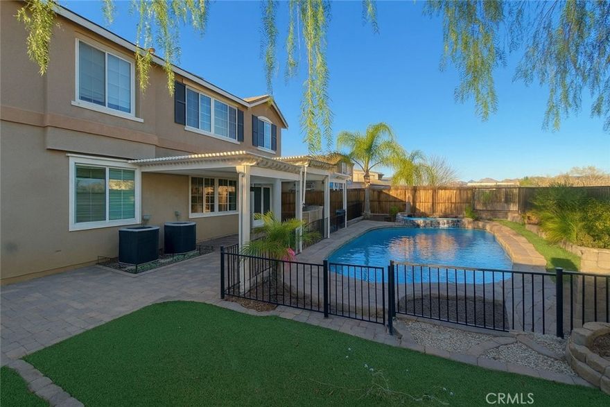 Welcome to your own private oasis in the heart of Rosetta Canyon! This stunning 4-bed, 3-bath residence offers 3,242 sq ft of refined living space on a 7,841 sq ft lot, built in 2007 and designed for both entertaining and everyday comfort.



A grand, light-filled floor plan flows effortlessly from the entry and formal dining area into the heart of the home

Chef’s kitchen with granite countertops, an oversized island with bar seating, stainless steel appliances, under-cabinet lighting, and an oversized walk-in pantry.

Cozy family room with soaring ceilings, a fireplace, and views to the backyard

Downstairs bedroom & full bathroom—ideal for guests or multigenerational living

Luxurious upstairs primary suite with a retreat area, cozy fireplace, dual sinks, separate tub + shower, private water closet, and dual walk-in closets 

Three additional upstairs bedrooms, a shared bath with dual vanities, plus a loft and a convenient upstairs laundry room.

Outdoor & Yard Appeal

Step outside into the entertainer’s dream backyard featuring:

A custom saltwater pool and spa (complete with safety fencing) — your personal resort just steps away 

Covered patio and tiered artificial turf areas for low-maintenance yet lush appeal 

Panoramic valley and ridge views that give privacy and a serene backdrop 

Extras & Community Perks

Attached 3-car garage for room and flexibility 

Central A/C & heating, double-pane windows, and a solar panel lease to help lower utility costs 

Located in a cul-de-sac for peace and quiet, yet minutes from shopping, dining, the 15 Freeway, and Lake Elsinore 

Membership in Rosetta Canyon HOA with access to amenities like sports courts, parks, and secure community areas.



Don’t miss your chance — properties like this in Rosetta Canyon don’t last. Contact me today to schedule your private tour and experience the resort-style living this home delivers.