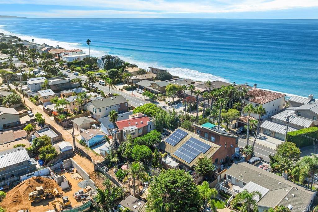 Located on one of the most coveted oceanfront streets in Encinitas, 515 Neptune Avenue presents a rare chance to own a property in this highly sought-after coastal enclave. Just steps from the sand and surf, this home offers some ocean views and endless potential. Set on an expansive 11,000+ sq. ft. lot, the property features a spacious main residence complemented by a single-level 2-bedroom, 1-bath ADU, ideal for multi-generational living, extended guests, or income potential. Outdoor living shines with a Pebble Tec pool and plenty of space to re-envision your own private retreat. Additional highlights include an attached 2-car garage and the versatility to either refresh the existing home or design a brand-new custom coastal estate. This property represents more than a home—it’s an opportunity to remodel or build new in one of the most desirable locations along the Southern California coastline.