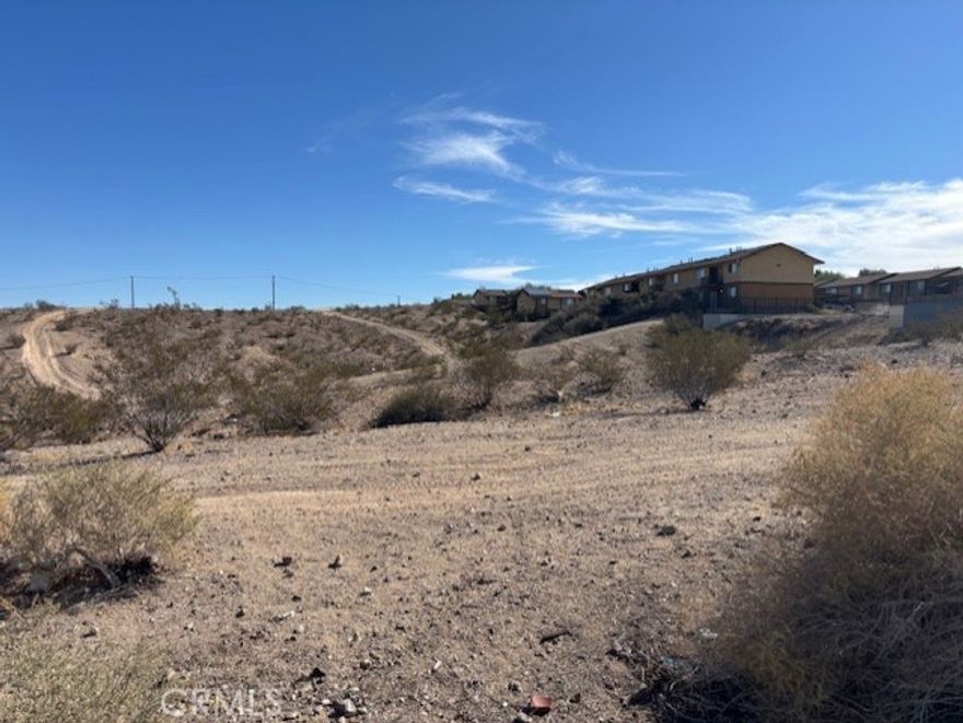 The BNSF Railway intermodal project in process will be the largest intermodal project in the world, bringing +/- 20,000 new jobs that are expected to generate a high demand for housing.
Two Indian tribes are seeking approvals for proposed casinos at the I-15/Lenwood Road intersection/home to The Outlets at Barstow, that would each bring +/- 1,000 construction jobs and 1,000 permanent jobs that would stimulate extensive retail development in that area, therefore an additional   need for housing.

The property consists of two adjacent level parcels zoned medium density, adjacent to one of Barstow's nicest apartment projects.
Sewer/water/utilities are in Rimrock Road, fully improved with street/curb/gutter.
Rimrock Road is the major east/west road south of Interstate 15, with four lanes and turning lanes.
The property is near Super Walmart on Montara Road Barstow Community College.
Easy access to both Interstate 15 and Highway 40. Less than 5 minutes to Main Street/downtown - note that Barstow has the longest Main Street on Route 66 in the entire United States and attracts thousands of tourists a year.