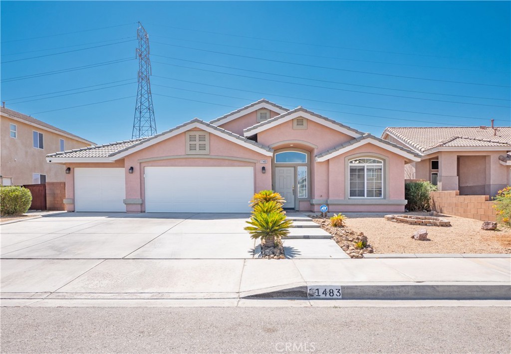Beautifully Maintained Single-Story Oasis with Pool & Private Backyard!! Welcome to this spacious and meticulously maintained single-story home, offering the perfect blend of comfort, style, and functionality. From the moment you arrive, you'll notice the fresh exterior paint and pristine curb appeal that set the tone for what’s inside. Step into a bright and open-concept floorplan ideal for everyday living and entertaining. The heart of the home is the stunning kitchen, featuring a massive custom-built island with gorgeous pendant light fixtures above, wine fridge, and seamless flow into the dining area—complete with a cozy fireplace perfect for family gatherings or dinner parties. Enjoy indoor-outdoor living with a gorgeous backyard retreat that boasts a sparkling pool, relaxing jacuzzi, and privacy with no rear neighbors. Whether you're hosting guests or enjoying a quiet evening, this outdoor space is truly special. The primary suite offers a peaceful escape, featuring a large walk-in closet with what could be his-and-her sections and a luxurious en-suite bathroom with a beautiful double vanity and stone counters and a perfectly sized linen closet. A separate fourth bedroom, thoughtfully positioned away from the others, provides ideal flexibility as a home office, guest suite, or private retreat. Additional highlights include: Fresh interior and exterior paint, Newer AC and water heater, three-car garage with dedicated A/C unit — perfect for hobbyists or storing big toys. Spacious layout designed for modern living. Every inch of this home has been lovingly cared for and is move-in ready. Don't miss the chance to make this stunning property your own.