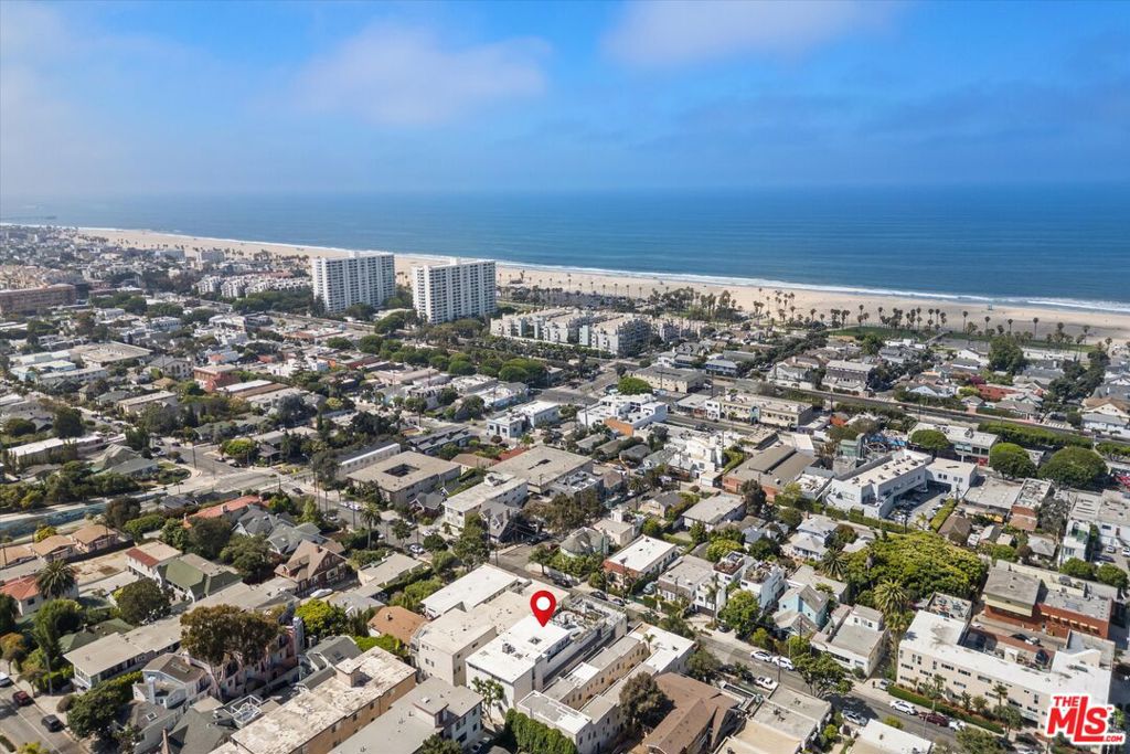 Welcome to your Santa Monica beach retreat, located in the heart of Ocean Parkjust blocks from the sand, surf, and the best of Main Street. This bright and stylish 1-bedroom, 1-bathroom unit offers an open-concept layout with great natural light and a fresh, modern feel. The spacious bedroom includes ample closet space, while the updated bathroom adds a sleek touch.What truly sets this home apart? A rare two-car parking setup, an unbeatable location next to beautiful Hotchkiss Park (think San Francisco charm meets SoCal sunshine), and access to one of the largest shared rooftop decks in Ocean Parkoffering sweeping, panoramic ocean and city views. Perfect for morning coffee, sunset cocktails, remote work, or just soaking up the sun.Step outside and you're only blocks to the beach, boardwalk, bike paths, and top local favorites like Urth Caff, Shoop's Deli, Samosa House, and world-class sushi. Main Street, Rose Avenue, and Abbot Kinney are all within reach, as is easy freeway and Metro accessmaking this a prime Westside value.Whether you're a first-time buyer seeking a beach pad, a savvy investor eyeing rental potential, or someone looking to make light updates and create a dream coastal escapethis is the one.Don't miss outthis is Ocean Park living at its best. See Pvt remarks for showing requests.