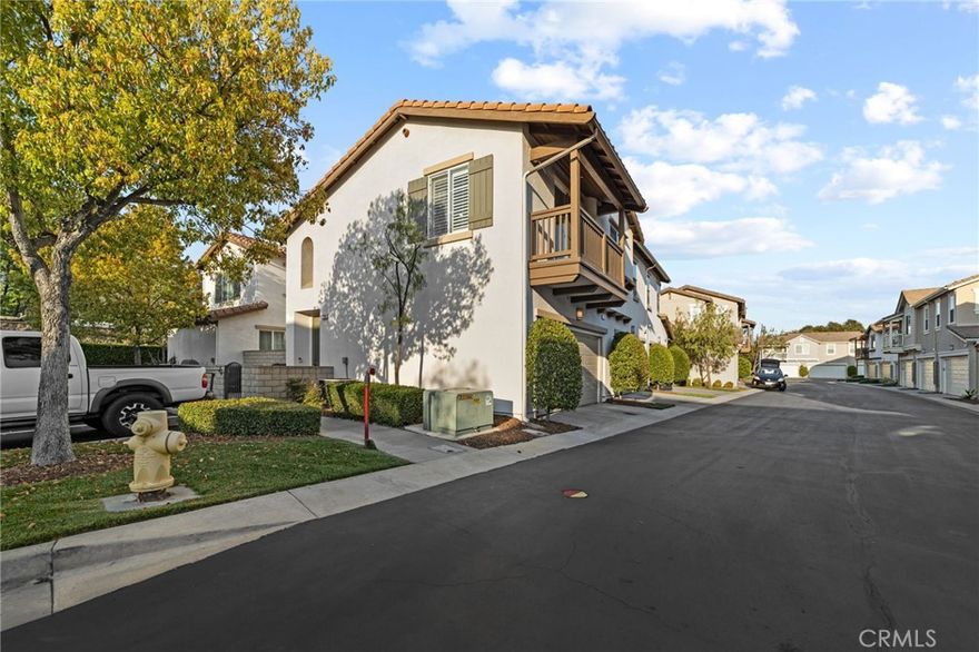 Welcome to 799 Park View Terrace in the beautiful gated Arboreta community of Glendora! This stunning 2-bedroom, 2-bathroom condo offers modern comfort and a spacious open layout in a serene neighborhood setting. Enter through a private courtyard into the first-floor entryway with direct access to the attached 2-car garage, then head upstairs to the main living area filled with natural light. The inviting living room features a cozy fireplace, while the beautifully upgraded kitchen offers abundant cabinetry and stainless-steel appliances, opening seamlessly to the dining area, perfect for both everyday living and entertaining. Sliding doors off the dining room lead to a private balcony overlooking the peaceful community. The primary suite feels like a private retreat with its beautifully upgraded bathroom, complete with a large soaking tub, walk-in shower, and dual vanity. Additional highlights include in-unit laundry, high ceilings, and thoughtful design details throughout. Residents of Arboreta enjoy access to resort-style amenities including a sparkling pool and spa, lush park areas, and scenic walking trails, all within a secure gated setting conveniently located near shopping, dining, and highly rated Glendora schools.
