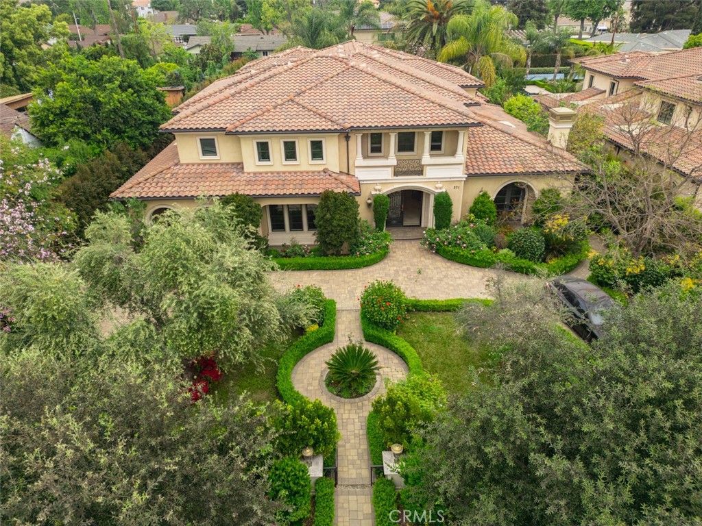 Beautiful Mediterranean Estate built by Franklin Development. This great property has alot to offer, from 6 bedrooms, 9 bathrooms, theatre room, wine room, formal study, gym room with sauna and dual staircase at the entry for that wow factor. The kitchen has wolf built in ovens and is bright and open to the informal dining area. There is a separate butler's kitchen and large pantry. Each bedroom is its own suite with a private bathroom and great closet space. The backyard offers landscaped grounds with sparkling pool, spa and waterfall as well as a covered patio with built-in BBQ area and courtyard for basketball. Great for entertaining. There are two car garages. The front has an added roundabout driveway. So many available amenities are only a short drive from the property.