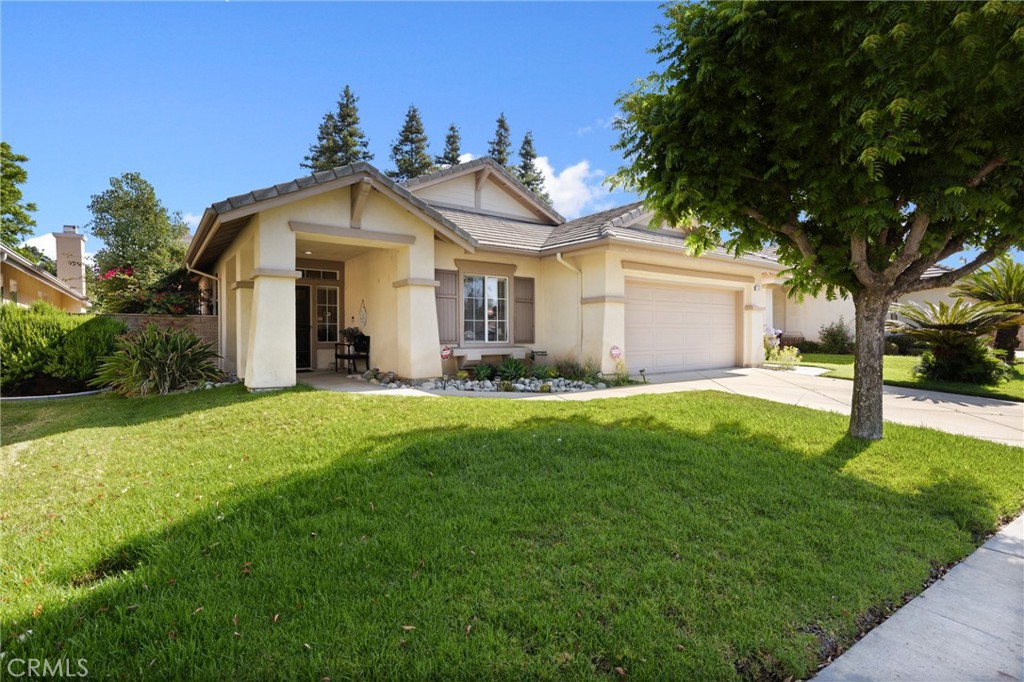 Welcome to 1581 Manor Lane, a beautifully updated single-story home built in 2000 and located on a peaceful cul-de-sac in a north Glendora desirable neighborhood. This 4-bedroom, 2-bathroom home offers approximately 2,002 square feet of living space on a generous 7,348 square foot lot. The open floorplan features vaulted ceilings, a spacious family room with a cozy fireplace, and a remodeled kitchen with granite countertops and modern appliances. The primary suite includes a walk-in closet and a luxurious bath with dual vanities, and walk-in shower. Enjoy a landscaped yard with a covered patio perfect for entertaining. Close to top-rated schools, parks, and downtown Glendora, this home offers comfort, style, and a prime cul-de-sac location.