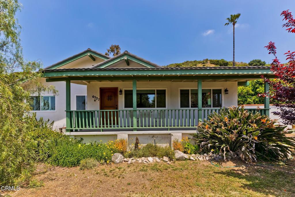 Two Houses on separate parcels plus vacant lot. 6527 Tokay- Impeccably remodeled and maintained, this private oasis is ready for it's new owner or tenant. Minutes from shops and restaurants but in a tranquil setting, the extra long porch with railing is perfect for relaxing with a morning coffee or glass of wine. Living room and dining area with Brazilian wood flooring. Working gas stove at rear of living room with beamed ceiling. Kitchen with breakfast and laundry areas. Generous storage. Maytag stove and dishwasher. Primary suite with shutters, ceiling fan, and large remodeled tile bathroom with separate shower and jetted tub, farmer's sink, quartz counter and walk-in closet. Secondary suite with shutters, ceiling fan, and remodeled three-quarter bath. Rear patio with lattice overhang and passion fruit vines. Renovations include newer front door, remodeled bathrooms, insulation above living room, tankless water heater, mostly newer dual pane windows and slider for energy efficiency, and new block wall. Drip irrigation system for a multitude of fruit trees, including pomegranate, persimmon, Meyer lemon, lime, blood orange, fig, guava...and more! Ductless split A/C system. Home shows as three bedrooms on public records but bedroom wall was removed to expand the living room. Currently two bedrooms but may be easy to convert back to three bedroom. Cal-Pac aluminum tile roof. Earthquake bolting done in 2024. Total of all three parcels - 50,765 sq ft. 6531 Tokay was extensively remodeled in 2021, with permits. This two bedroom, one bath 904 square foot home has a remodeled kitchen and bathroom, newer central air, flooring, electric, electrical panel, plumbing, windows, interior and exterior doors (except kitchen door), and new gutters. All appliances, including washer/dryer, to remain. Two, one-car garages. Cal-Pac aluminum tile roof.Both homes have their own septic tank which was re-done in approximately 2019.The vacant parcel is above the two homes. There is a large flat pad. Total square footage of the three lots is 50,765 square feet, per public records. 6527 Tokay shows as 12,035. 6531 Tokay shows as 6,641 square feet and the vacant lot shows as 32,089 sq ft.