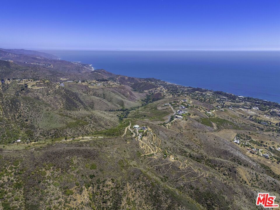 Spectacular panoramic views from this three acre parcel in the highly coveted Murphy Way area of Malibu. Overlooking Zuma, Point Dume and the Winding Way area, this lot has arguably some of the best views available. Ocean, city light and coastline views are prominent from the building pad just off the road. Ready to be developed, the land is just outside the incorporated city limits allowing for permitting through Los Angeles county. Adjacent to two lots that are also on the market, the area is quickly becoming home to large view estates. Buy now and benefit from recent development and rise in prices.