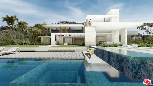 One of the best promontory view lots in Beverly Hills. Incredible opportunity to save costs and time renovating current structure or building new on this extremely rare nearly 3 acre lot. Sited at the end of a cul-de-sac with panoramic views from Downtown LA, Century City to the Ocean. Extremely private, this property offers the chance to build a one of a kind estate on one of the largest promontories in Beverly Hills. Conceptual plans by Internationally acclaimed architecture firm SAOTA based on current site improvements. Email Listing Agent for Offering Memorandum.
