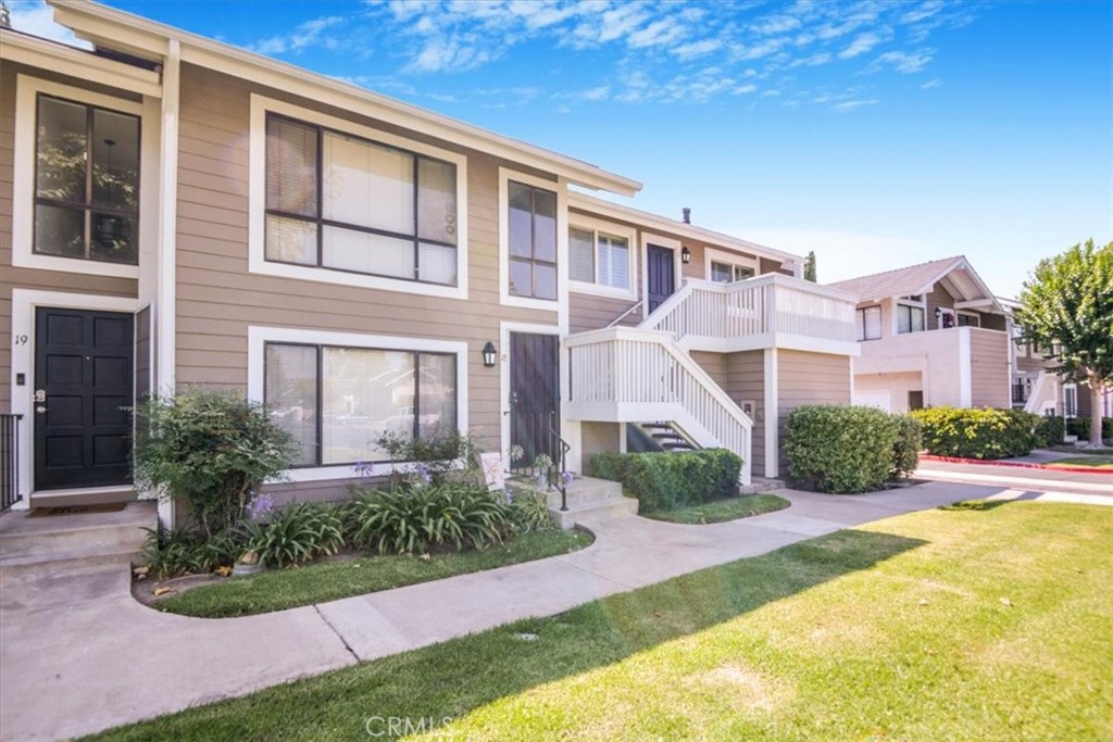Bright and serene 2-bedroom condo with lush, leafy views. Located within walking distance to Chapman University and the historic Old Town Orange district. Enjoy the convenience of an in-unit laundry room and high ceilings. Featuring newer windows and elegant engineered wood flooring throughout. Comes with a single-car garage plus an assigned parking space and plenty of guest parking.