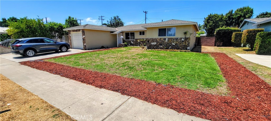 This is a Fabulous single story newly remodeled home. Only a few miles from Disneyland and 3 DESIRED schools also. Located close to I-5 and 22 for easy access to anywhere. Perfect for your family :) With a permitted Sun room ( An additional 91 sq ft) to add to the outdoor experience without the bugs lol. HUGE yards ( Backyard especially) with new lawns, landscape and flowers added. Extra large driveway also RV parking on the side. Gated backyard/side yard. 1 car garage. Exterior painted 1 year ago.
The home was just remodeled inside. Upgraded kitchen with white cabinets and knobs, Granite countertops also energy saver dishwasher. Bathrooms are fresh new paint and hardware also. Half the windows are Brand New and the others only a few years old. New front door and exterior lighting. Beautiful new laminate flooring to welcome you home upon entry. Open, bright, airy floor plan/Great room perfect for daily family time with added sun room for outdoor living with indoor comforts. 4 bedrooms (2 extra large) 2 Full Bathrooms. New lighting throughout the home, also title floors in Kitchen and baths. This home shows the long time home owners took great care of the property :)
A Huge Avocado Tree and Lemon trees in backyard. Producing incredible fruit and shade for the sun room too. This will be a great house for you and your family to make your home