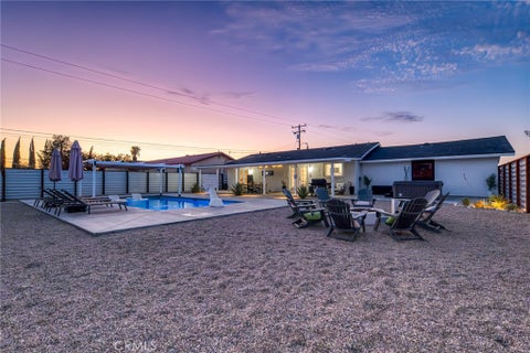 Photo of 74107 Pinon DR, 29 Palms, CA 92277 (MLS # JT26173794)