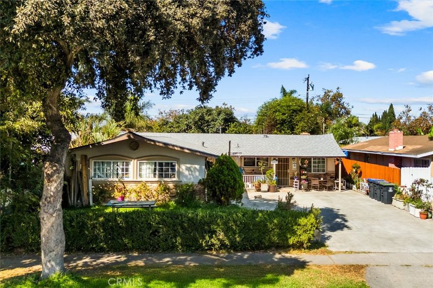 Welcome to 3413 W James, a spacious Santa Ana home featuring 5 bedrooms and 3 bathrooms with a bright, functional layout. The interior offers wood-style and tile flooring, generous living areas filled with natural light, and a well-equipped kitchen with plenty of storage. With five versatile bedrooms, the home can accommodate a large family, multigenerational living, or investment use. The backyard includes a covered patio, mature landscaping, and raised planter beds, creating a private outdoor retreat. Located less than 10 miles from Disneyland Resort and close to the Bowers Museum and Discovery Cube Orange County, this property combines comfort, space, and convenience in the heart of Orange County.