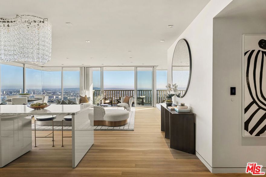 Experience the pinnacle of full-service high-rise living in this premier residence at the legendary Sierra Towers. Perfectly situated on the coveted southeast corner "6 line," this expansive unit offers sweeping, unobstructed views stretching from the Griffith Observatory and Downtown LA to Century City and the Pacific Ocean. Floor-to-ceiling windows flood the spacious living room and primary suite with natural light, fully embracing the breathtaking panorama.Thoughtfully designed, the residence features a walk-in closet, dedicated office enclave, and sophisticated layout ideal for both comfort and entertaining. Enjoy world-class amenities including 24/7 concierge and valet, two state-of-the-art fitness centers, a stunning pool and sundeck, and the privacy and prestige of one of Los Angeles' most iconic addressesperfectly positioned between Beverly Hills and West Hollywood.