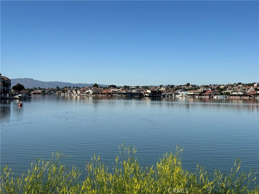 HUGE PRICE ADJUSTMENT!!!   Beautiful OPEN WATER lot to build your dream home on in the highly sought after private community of Spring Valley Lake. Spring Valley Lake offers "Resort Style" living! Lot has block walls on 2 sides of property and 59' of water frontage. 



This community offers so much! Spring Valley Lake member amenities include a 200-acre waterski lake with marina and fuel, a beach with swimming area, a community building, three parks, fourteen fishing areas, and an equestrian center. Located within the community is an award-winning Steel Canyon Golf Club Corp. 18-hole golf course and country club. The community has a 24/7 Public Safety Department that provides professional security services on Association property, medical aid response, lake patrol and general assistance. Security in the community is further enhanced through the use of security cameras placed at all entrances.

 

There is a multitude of groups and classes you can join. You can attend the Summer Kickoff Concert series on the West Beach and enjoy fabulous music. There is also the fireworks display June 28th from the lake to celebrate 4th of July early.  With all these amenities you can see why Spring Valley Lake has come to be known as "The Jewel of the High Desert."   *Some amenities require membership to the Bear Valley Country Club.