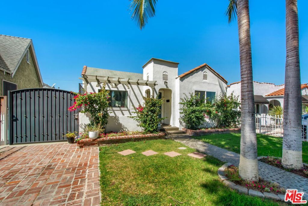 Photo of 7319 S Denker Avenue, Los Angeles, CA 90047 (MLS # 25588859)