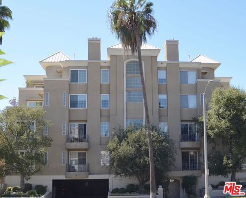Photo of 2349 BEVERLY GLEN Boulevard #101, Los Angeles, CA 90064 (MLS # 26668875)