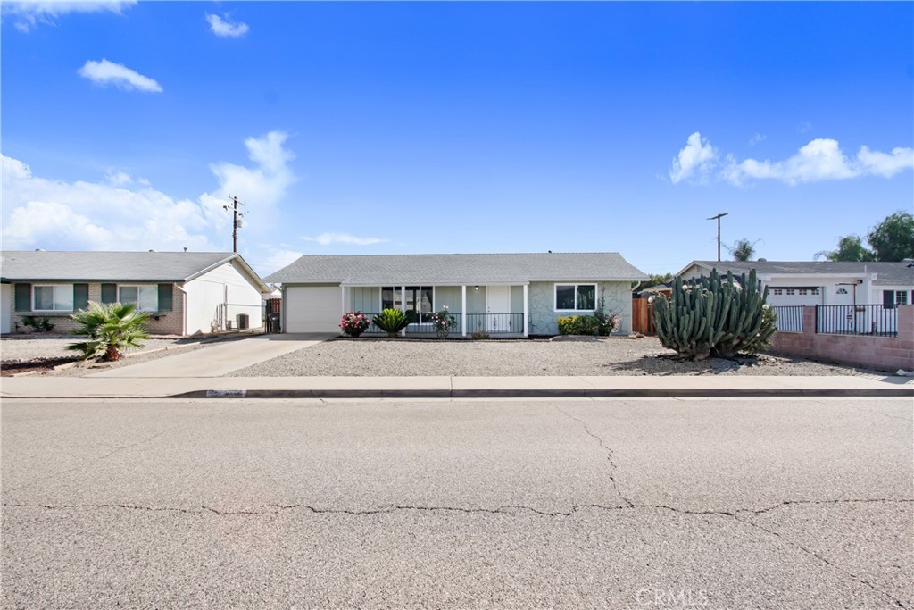 Welcome to this beautifully upgraded 2-bedroom, 1-bathroom home located in the highly desirable 55+ Sun City Civic HOA community. Thoughtfully updated throughout, this 992 sq ft home sits on a generous 6,534 sq ft lot with low-maintenance desert landscaping and a 1-car attached carport with door. Step inside to find all-new laminate and tile flooring, fresh interior and exterior paint, and dual pane windows that bring in natural light while improving energy efficiency. The brand-new kitchen features modern cabinets, a stylish tile backsplash, and stainless steel appliances. The bathroom has been updated with a new vanity and a sleek walk-in shower. Additional highlights include a dining room, laundry room, a new roof, and an upgraded 200 AMP electrical panel—offering both comfort and peace of mind. Enjoy all the amenities Sun City Civic HOA has to offer including pickleball, pools, clubhouse, and more. This move-in-ready gem is the perfect blend of modern convenience and active community living!