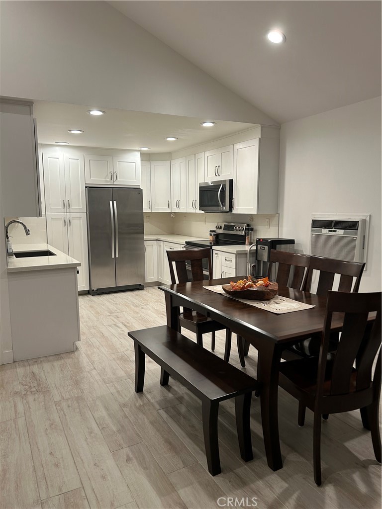 Professional Photos Coming!!....Step into this stunning, fully remodeled one-bedroom, one-bath atrium home located in the highly sought-after community of The Lakes! This desirable end-unit offers exceptional privacy with no neighbors above or below.  Every inch of this residence has been thoughtfully reimagined and upgraded—taken down to the studs and rebuilt with modern comfort and style in mind. Upgrades include new drywall, updated electrical, Pex plumbing to a completely redesigned kitchen and bathroom, no detail was overlooked. The kitchen has been expanded to include more space plus additional cabinetry and a highly functional cooking area that flows beautifully into the living space creating a large great room! Perfect for entertaining or large gatherings. Soaring vaulted ceilings enhance the sense of openness, while smooth-finished ceilings and tile flooring seamlessly flows throughout the home. The generously sized bedroom features a full wall of custom cabinetry for premium storage. The adjacent bathroom is equally impressive, showcasing a contemporary remodel with quartz countertops, abundant linen storage, and a gorgeous step-in shower.
This is truly a turnkey home where style meets tranquility—perfect for those seeking an elevated and modern living experience in a serene setting. The El Dorado Lakes community also offers a nature filled environment abundant with flora and wildlife. There are also numerous amenities such as tennis courts, swimming pools and a gym for those looking for an active lifestyle.  Topped off with a great location with nearby freeway access, El Dorado Park and nearby shopping, dining and public schools. Schedule your tour of this turn-key home today!