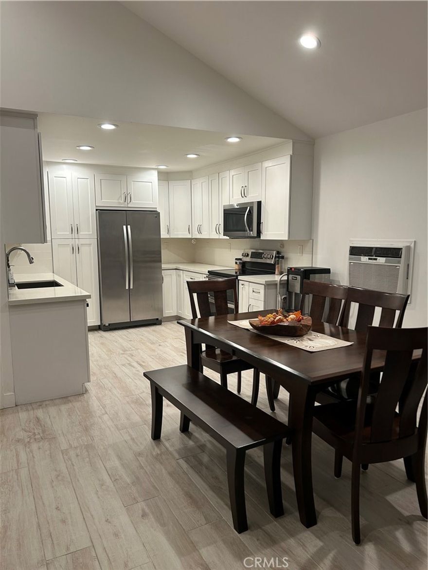 Professional Photos Coming!!....Step into this stunning, fully remodeled one-bedroom, one-bath atrium home located in the highly sought-after community of The Lakes! This desirable end-unit offers exceptional privacy with no neighbors above or below.  Every inch of this residence has been thoughtfully reimagined and upgraded—taken down to the studs and rebuilt with modern comfort and style in mind. Upgrades include new drywall, updated electrical, Pex plumbing to a completely redesigned kitchen and bathroom, no detail was overlooked. The kitchen has been expanded to include more space plus additional cabinetry and a highly functional cooking area that flows beautifully into the living space creating a large great room! Perfect for entertaining or large gatherings. Soaring vaulted ceilings enhance the sense of openness, while smooth-finished ceilings and tile flooring seamlessly flows throughout the home. The generously sized bedroom features a full wall of custom cabinetry for premium storage. The adjacent bathroom is equally impressive, showcasing a contemporary remodel with quartz countertops, abundant linen storage, and a gorgeous step-in shower.
This is truly a turnkey home where style meets tranquility—perfect for those seeking an elevated and modern living experience in a serene setting. The El Dorado Lakes community also offers a nature filled environment abundant with flora and wildlife. There are also numerous amenities such as tennis courts, swimming pools and a gym for those looking for an active lifestyle.  Topped off with a great location with nearby freeway access, El Dorado Park and nearby shopping, dining and public schools. Schedule your tour of this turn-key home today!