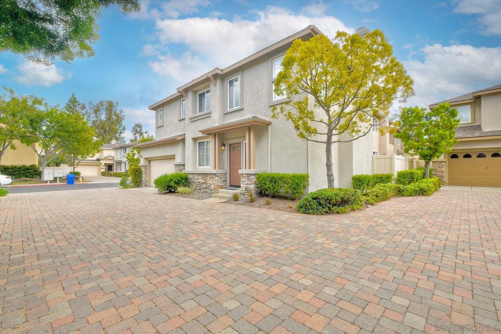 Pristine, West-Facing Corner Lot Home in Stratford Place! Welcome to this sun-drenched, beautifully maintained Model 1 residence in the highly desirable Stratford Place community. Nestled on a premium corner lot, this 3-bedroom, 2.5-bathroom home spans approximately 1,346 sq ft and combines thoughtful upgrades with timeless style. Step inside and be greeted by an abundance of natural light, plantation shutters, and a harmonious blend of Berber carpet, hardwood, and tile flooring. Additional highlights include central A/C, plenty of storage, and a location that offers easy access to parks, shopping, and top-rated schools. The open-concept main level features maple cabinetry and handrails, along with solid Corian countertops and backsplash, a stainless steel sink, and instant hot water at the kitchen—perfect for morning tea or quick cooking needs. A leaded glass window upgrade at the entryway adds a touch of elegance, setting the tone for the rest of the home. See Supplement=> The third bedroom, currently outfitted with charming French doors, offers flexibility as a spacious home office, den, or guest retreat. Upstairs, the primary suite is a serene retreat with a walk-in closet, dual sinks, and an upgraded shower enclosure—offering a spa-like feel right at home. A full-size, side-by-side laundry area and attached 2-car garage add to the convenience. Outside, unwind or entertain in your low-maintenance backyard, featuring a beautiful flagstone patio—a perfect setting for weekend gatherings or quiet evenings under the stars. Enjoy resort-style living in the Heart of San Diego! Stonecrest Village is conveniently located off Aero Drive & just an Interstate 15 off-ramp North of Mission Valley shops, Costco Warehouse & Gas Station, Lowes Home Improvement Center, Ikea, restaurants & the newly constructed Snapdragon Stadium. The 318 Acre Community of Stonecrest is minutes from most all of the major Central San Diego amenities. Each of the 6 subdivisions are surrounded by Tree-Lined Streets and enjoy membership to the State of the Art, Award Winning, Resort like Clubhouse, featuring a Junior Olympic Lap Pool, Spa, Lighted Tennis Courts, Tot-Lot, Picnic Areas, Media Room with Library, 2nd Pool Facility also with Spa, Park, Greenbelts & Trails for Walking, Jogging, Biking and Much More!