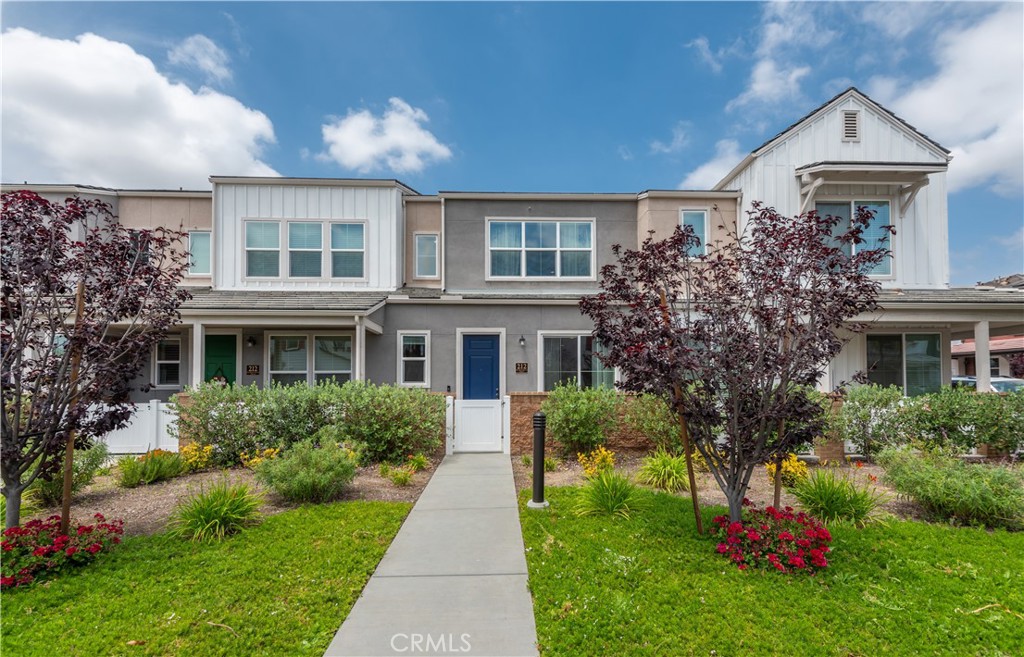 This turnkey 3-bedroom, 2.5-bath townhome is nestled in the highly sought-after Westerly community, offering a perfect blend of modern style and sophistication. With its stylish design and premium finishes, this residence feels like a model home.
From the charming front landscaping and inviting patio to the bright, open interior, this home impresses at every turn. The spacious living area features sleek, newer laminate flooring, soaring ceilings, recessed lighting, and an abundance of natural light, creating an inviting atmosphere throughout.
The heart of the home is the open-concept kitchen boasting stainless steel appliances, quartz countertops, a large center island, an elegant white farmhouse sink, beautiful white subway tile backsplash, and plenty of workspace—ideal for both everyday living and entertaining.
Upstairs, the expansive primary suite is a serene retreat, featuring high ceilings, a spa-inspired bath with dual sinks, a walk-in subway-tiled shower, and a generous walk-in closet. Two additional well-sized bedrooms also feature high ceilings and share a well-appointed bathroom with dual vanities and a shower/tub combination. For added convenience, the laundry closet is thoughtfully located upstairs.
Additional features include an attached two-car garage with direct access, soft-close cabinetry throughout, solar panels, a tankless water heater, 5.1 surround sound speakers, and a state-of-the-art Lennox Home Control system.
Residents of The Westerly enjoy resort-style amenities, including a sparkling pool, bocce ball court, firepit, rose garden, dog park, and children's playground.
Experience contemporary living at its finest—welcome home to The Westerly!