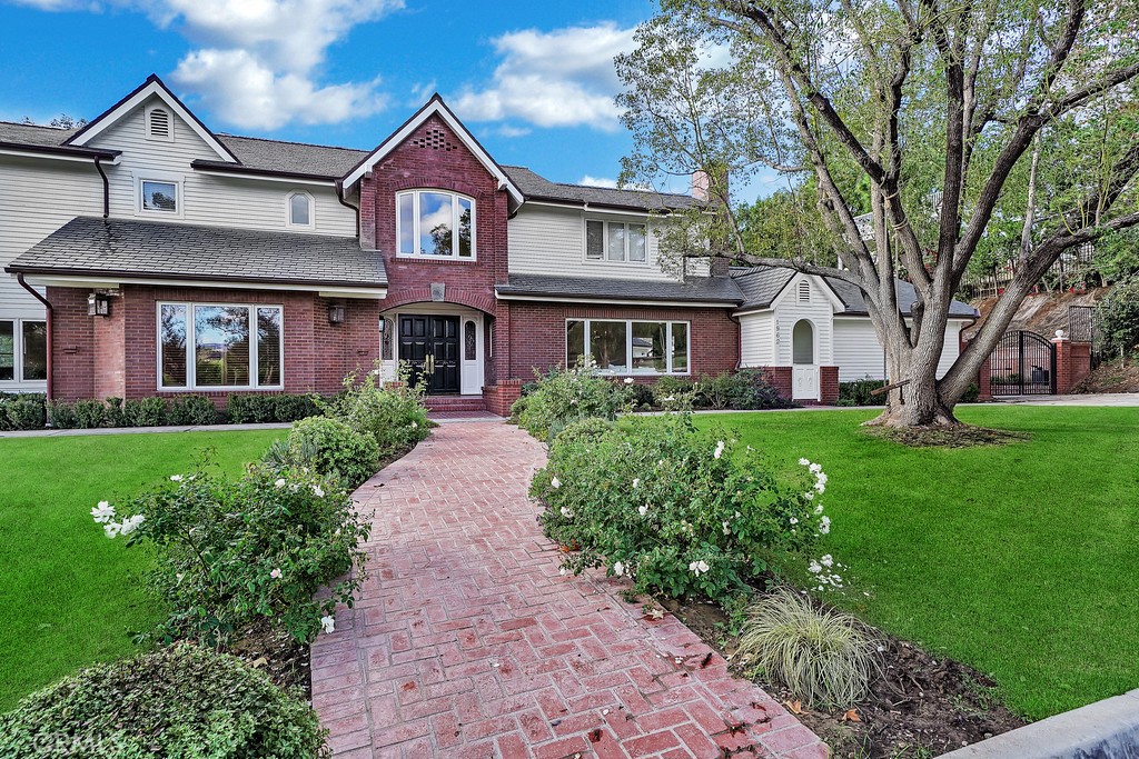 A rare luxury rental in the heart of Lemon Heights, this property underwent a down-to-the-studs renovation and is ready for someone to call home! High-end finishes include an 8-burner Wolf Range with dual oven, massive Sub-Zero refrigerator/freezer, marble and soapstone counter tops, fine stonework and tiles used throughout. The downstairs features a large, wood-paneled office, formal living room with fireplace, formal dining room off of the amazing kitchen with prep area, an informal living room with fireplace and large bar/entertaining area attached, and a specious laundry room with Maytag washer/dryer. The six bedrooms are upstairs, all of which are en-suites, and include a large and bright primary bedroom, with a well-appointed bathroom and fireplace. There's also an additional suite, complete with a mirrored studio/living room, attached to a bedroom, a small refrigerator and extra sink. The home has a 2-car garage tucked behind a motorized vehicle gate and large driveway. The backyard has a combination of great views, privacy, entertaining space, and a wonderful three-tiered pool/spa. The home is also located directly across the street from neighborhood Bent Tree Park, and only a short distance away from the Peters Canyon trail head, and other neighborhood trails. Tustin Unified School District with California Distinguished Schools: Arroyo/Hewes/Foothill. Landlord to pay for water, gardener, pool maintenance, sewer and trash. Available partially furnished.