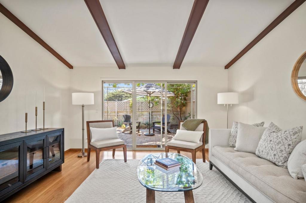 Beautifully updated and impeccably maintained, this 2-bedroom, 2-bath unit is located in the desirable Hacienda Carmel community. The light-filled living room features open beam ceilings and flows seamlessly into the open-concept kitchen, complete with custom cabinetry. Enjoy mountain views from the enclosed patio and the convenience of being just moments from the community center. Nestled along the Carmel River, Hacienda Carmel is an adult community offering an array of amenities including dining, fitness, gardens, walking paths, and a variety of onsite activities - all just minutes from downtown Carmel and its world-renowned charm.