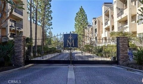 Photo of 5565 Canoga Avenue #318, Woodland Hills, CA 91367 (MLS # SR26089510)