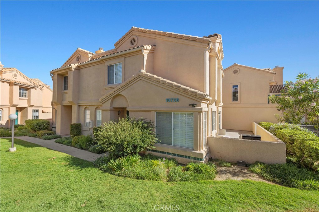 **Conventional Loans as low as 3% down are welcome! This is a warrantable community now!** Welcome home to this beautiful 3 bedroom, 2.5 bathroom townhome with an oversized wrap-around patio in the beautiful gated community of Vista Del Canon! Upgraded kitchen with walk-in pantry, granite counters, white cabinets, and upgraded appliances. The living area and dining room have beautiful wood-like laminate and the downstairs half bath has been remodeled with modern finishes. Newer AC, heater, and water heater. Upstairs you'll find all three bedrooms and a separate laundry room. Your spacious primary bedroom with vaulted ceilings has mirrored closet doors and an ensuite bathroom. Shower & tub combos in both upstairs bathrooms. This condo has been well-cared for and truly has one of the largest patios in the community. Plenty of parking with your own 2-car side-by-side garage AND 2 additional parking passes for the community. There are two community pool areas, a kids playground, 24/7 security, and the HOA dues pay for your water and trash! With Santa Clarita's award winning schools, nearby metrolink, several grocery stores and restaurants within walking distance (including Costco!), and the 14 freeway less than 5min away this is truly the perfect location. No Mello Roos!
