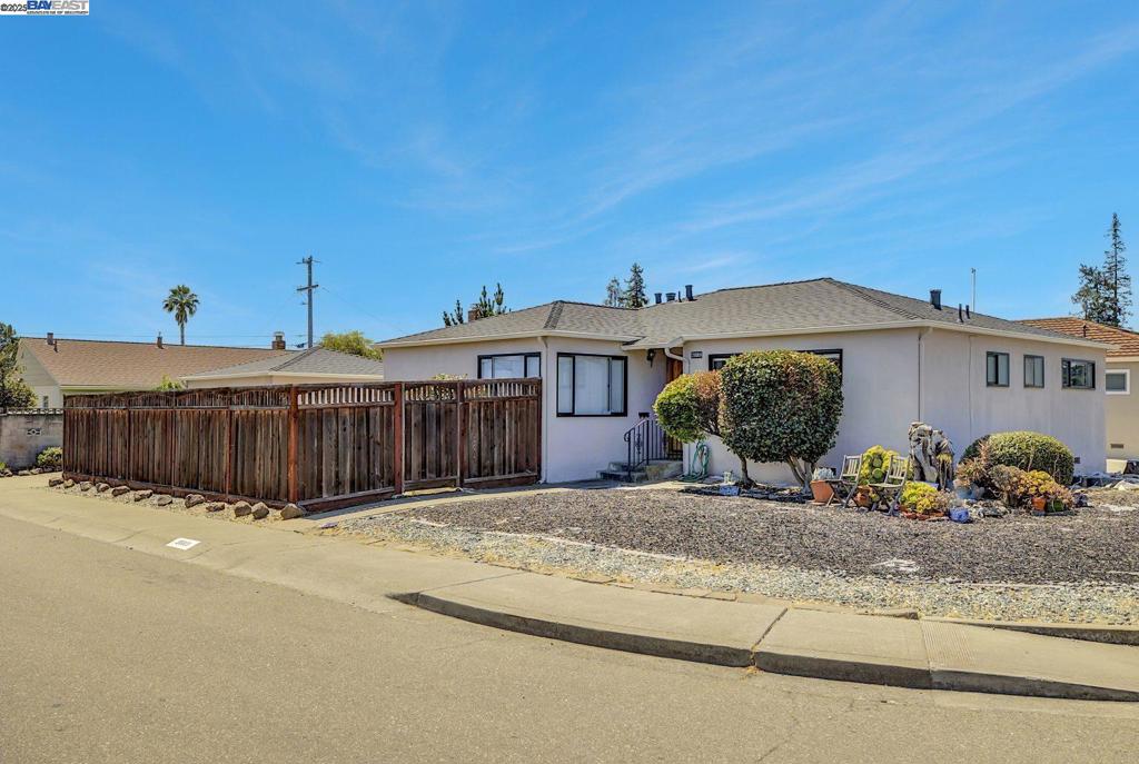 Lovely single-story home in a convenient Castro Valley location. Three spacious bedrooms and two bathrooms. The kitchen and dining area feature updated flooring, while original hardwood floors flow throughout the home. Ready for some TLC, this home offers a great opportunity to create your dream space. Enjoy a large enclosed patio for outdoor living and a detached garage for parking and storage. Easy access to BART and Highway 580. Close to top-rated Castro Valley schools and the Castro Valley Marketplace.