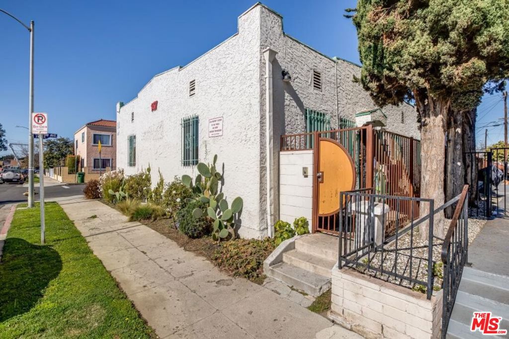 Presenting a prime investment opportunity in one of Los Angeles' most consistently high-demand rental markets, 1497 W 29th Street offers exceptional upside and long-term value just steps from the University of Southern California (USC). This well-maintained, income-producing 8-unit multifamily property features a desirable unit mix of six singles and one spacious 2-bedroom, 1-bathroom unit, making it an ideal acquisition for both seasoned and first-time investors.Set on a prominent corner lot, this gated complex offers a secure environment for tenants with modern security enhancements including a fully fenced perimeter, key-controlled entry, and strategically placed security cameras. Tenants also enjoy the convenience of on-site laundry, gated on-site parking, and a newly upgraded 100-gallon water heater to ensure comfort and functionality. The property is master-metered for gas and electric, offering operational simplicity and cost-effective management.This turnkey property boasts major system upgrades, including a newer roof, updated copper plumbing, and fully upgraded electrical systems. These enhancements significantly reduce future maintenance costs and provide peace of mind for ownership. The newly paved and gated parking lot adds curb appeal and additional tenant convenience, further enhancing the property's marketability.Location is everythingand 1497 W 29th St delivers. Situated within the USC DPS Patrol and Response Area, this asset is particularly appealing to student renters and parents seeking added safety. It's only minutes from the I-10 and I-110 freeways, offering easy access to Downtown LA, Koreatown, and other major employment and entertainment hubs. With consistent demand from students, faculty, and working professionals, this asset presents a strong rental upside in a neighborhood known for high occupancy rates and appreciation potential. 1497 W 29th St is more than just a property it's a strategic investment in the heart of Los Angeles. This information has been secured from sources we believe to be reliable, but we make no representations or warranties, expressed or implied as to the accuracy of the information. References to square footage or age are approximate. Buyer must verify the information and bears all risk for any inaccuracies.