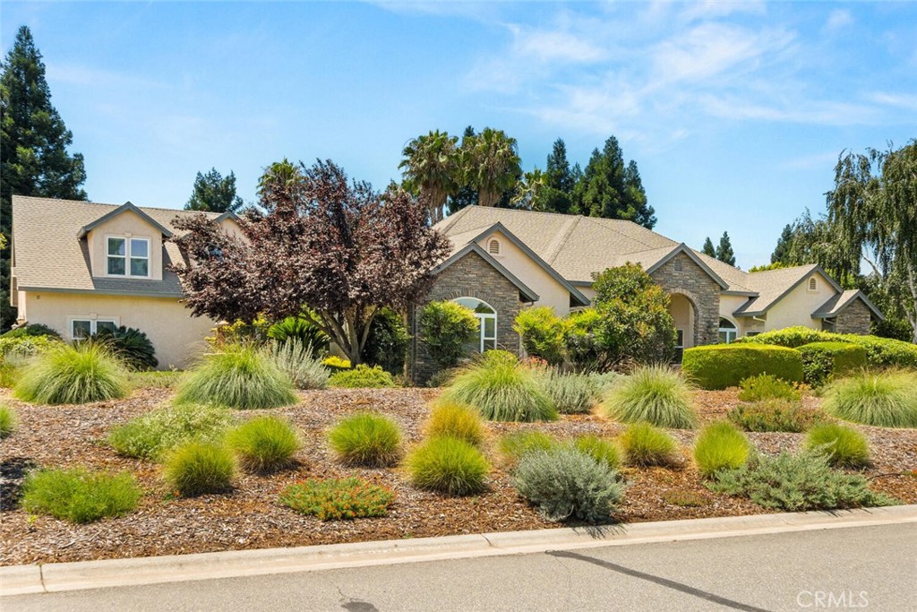 You’re going to love this custom-built, 3,597-square-foot home in a highly sought-after North Chico neighborhood! Situated on an expansive 0.83-acre corner lot, this property boasts incredible curb appeal and a serene, private backyard oasis. Some Key features include: Heated in ground pool, in-ground Spa, Owned 34 panel solar system, Water Softener, and Tankless Water heater with on demand feature. Inside the home you will find a split floor plan featuring an updated kitchen that is open to the family room with granite counter tops, double oven, dining nook, and a spacious breakfast counter! The primary suite is very spacious featuring a gas fireplace, dual walk-in closets, large tub & walk-in shower, granite counters, & custom built-ins. Other interior features include: Separate living room spaces, desirable Jack and Jill bedrooms, Formal Dining room, indoor laundry room and a very large bonus room upstairs that features as an office or a game room. There is wood flooring in the living spaces, with a wired sound system, and security system. The landscaping features mature landscaping in the backyard with an expansive patio perfect for entertaining. There is a very spacious 3 car garage, and potential RV parking. Expect to be impressed!