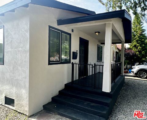 Photo of 9413 Virginia Avenue, South Gate, CA 90280 (MLS # 26800739)