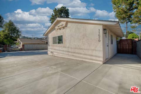 Photo of 11510 Fenton Avenue, Sylmar, CA 91342 (MLS # 26869445)