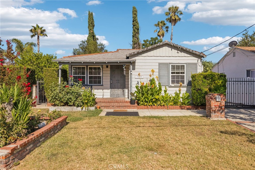 Nestled on a quiet residential street in the historic town of Reseda, this charming home blends character and function. Inside, sunlit open living and dining areas create a warm, welcoming atmosphere. The home features two cozy bedrooms, and a full bathroom. The home is complete with a separate laundry room, oak flooring, and custom closets.
Outside, enter to your private backyard oasis, complete with a sparkling pool, ideal for entertaining or relaxing. The detached garage offers exciting ADU potential, perfect for a guest suite or rental opportunity. This home is a unique blend of Valley charm and modern comfort—ready for its next story to begin.