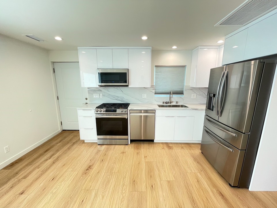 Modern Woodland Hills ADU with Private Entrance & Washer/Dryer
Enjoy the convenience of your own in-unit stackable washer and dryer in this beautiful ADU, built in 2023, with its own separate entrance and address for maximum privacy. This bright and modern unit features: Gourmet kitchen with quartz countertops, top-of-the-line stainless steel appliances including gas stove, dishwasher, refrigerator, microwave, garbage disposal, and ample cabinet storage, Central heat & A/C for year-round comfort, Custom closet cabinetry with shelving for efficient organization, New bathroom with modern shower, single sink vanity, and medicine cabinet, Double-pane windows with window shades, plus dimmable LED lighting throughout for energy efficiency, Tankless water heater for endless hot water, Private side yard—perfect for a small table and chairs, Located on a quiet, tree-lined residential street with plenty of street parking. Living room approximately 11' x 17.5, bedroom 10' x 7.5'. Located close to shopping, dining, the Westfield Topanga Mall, and minutes to the 101 freeway. Tenant pays water, electricity, gas, and trash.
This is a rare opportunity to lease a modern ADU in a desirable Woodland Hills neighborhood—perfect for those seeking comfort, convenience, and privacy.