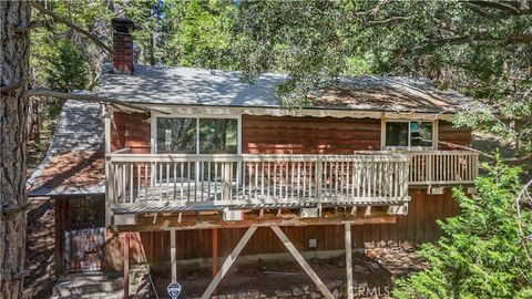 Photo of 1155 Chateau Dr, Crestline, CA 92325 (MLS # HD26065999)