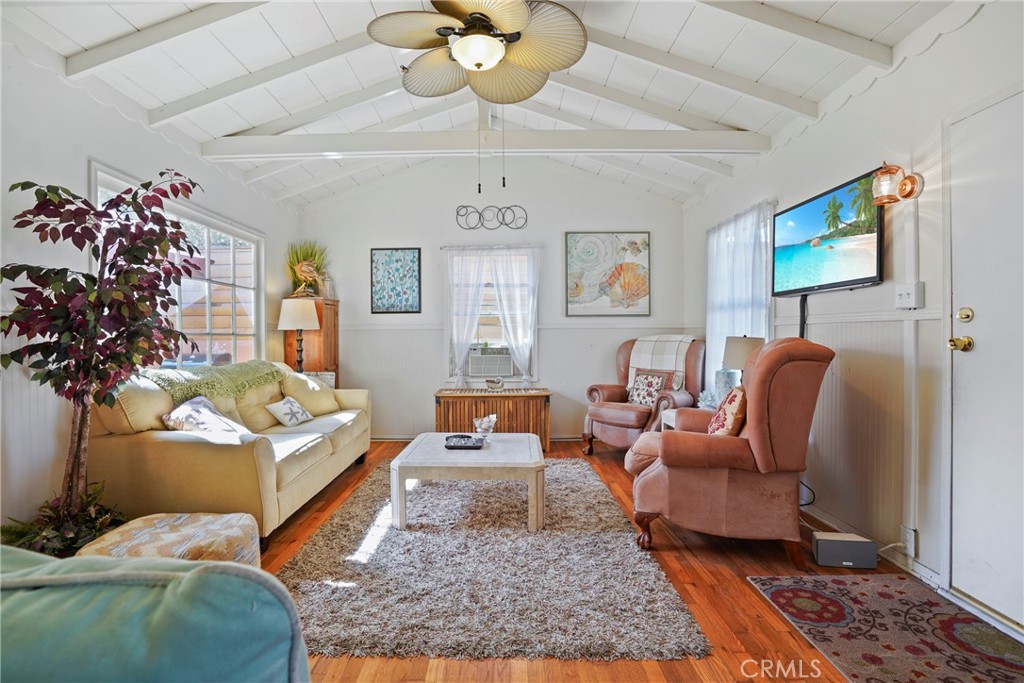 Discover the lifestyle at this enchanting 2-bedroom, 1-bathroom cottage nestled in the heart of Belmont Shore. This 792-square-foot gem perfectly captures authentic coastal charm while featuring thoughtful updates throughout that seamlessly blend vintage character with modern convenience. The property has been updated throughout to preserve its timeless cottage aesthetic while incorporating contemporary amenities and finishes. From modern electrical and plumbing systems to energy-efficient improvements, every aspect has been enhanced with meticulous attention to maintaining the homes charm while ensuring comfortable modern living. The welcoming front porch, where the beach community spirit comes alive through outdoor entertaining and the friendly hospitality Shore residents are famous for. Inside, the spacious living room features vaulted ceilings that create an airy, light-filled atmosphere. The beautifully renovated kitchen perfectly suits the cottage-style design with updated appliances, countertops, and cabinetry, while the cozy dining area comfortably accommodates four people.Multiple outdoor entertaining options include the charming front patio and private interior courtyard, both enhanced through recent landscape improvements. The primary bedroom provides a restful retreat with updated flooring and lighting, while the second bedroom offers flexible arrangements of furniture. The completely renovated spa-like bathroom creates a luxurious daily retreat with contemporary fixtures and beautiful tile-work, and the convenient interior laundry area adds modern convenience. While the detached garage offers storage and one car parking.What truly sets this property apart is its prime location in Belmont Shore with Airbnb permitted use permit in place, a neighborhood that perfectly balances small-town coastal charm with Beach activities, access to bay waters, perfect for kayaking and paddle-boarding, and scenic paths stretching for miles along the coastline to the heart of downtown Long Beach. The proximity to Naples Island provides access to two of Long Beach's most prestigious waterfront communities, with Naples offering charming canals and peaceful paths just minutes away. Residents and Short term rental occupants enjoy easy access to so much enjoy the entertainment venues that create a lively yet relaxed atmosphere. The property has has consistent Airbnb cash flow. Perfect to hold onto until 2028 Olympics when demand will soar! Look no further.