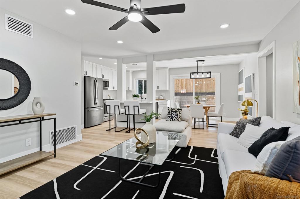 Welcome to your move-in ready home in the heart of Escondido! This beautifully renovated property sits on a flat, fully usable lot with plenty of room to customize, whether you want to add a garden, pool, or outdoor entertaining space. The wide driveway and dedicated RV parking make this home perfect for those with extra vehicles, toys, or trailers. Inside, you’ll love the fresh updates throughout. The home features brand-new luxury vinyl plank (LVP) flooring throughout the house, offering both durability and modern style. The open floor plan provides seamless flow between living and kitchen areas, ideal for everyday living and hosting. With its spacious lot, modern upgrades, and prime Escondido location, this home combines convenience, comfort, and potential all in one!