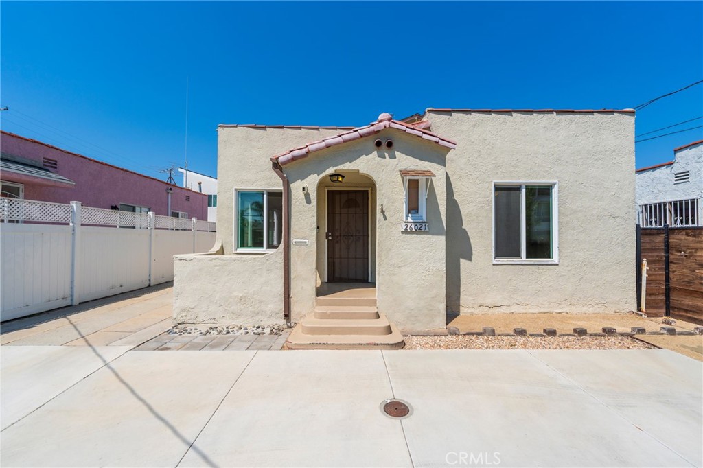 Step into timeless elegance with this 3-bedroom, 2-bathroom Spanish-style home in the heart of Harbor City. Offering 1,258 sq ft of living space on a 2,800 sq ft lot, this property blends the warmth of classic architecture with the comfort of modern living. Inside, natural light fills the open living area, highlighting textured walls, graceful archways, and unique period details that give the home its distinctive character. The kitchen has been upgraded with counters and countertops, providing a functional layout with plenty of storage and workspace, ready for both weeknight dinners and weekend entertaining. The primary bedroom offers a peaceful retreat, while the additional two bedrooms provide versatility for family, guests, or a home office. The second bathroom is tastefully designed for both style and practicality. Outside, the private yard offers the perfect space for enjoying Southern California’s year-round sunshine—ideal for a morning coffee, an evening BBQ, or a small garden. Located near parks, schools, shopping, dining, and major freeways, this home puts you near the South Bay’s beaches and vibrant coastal lifestyle. Whether you’re seeking charm, comfort, or convenience, this Harbor City gem delivers it all. Don’t miss this opportunity—schedule your showing today!