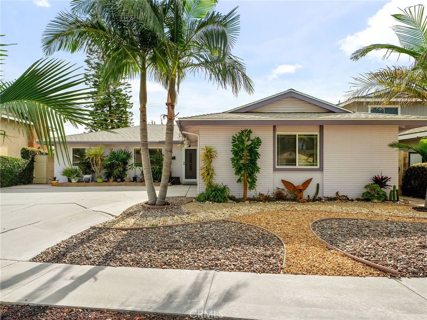 Pride of ownership describes this mid-century modern, single-story pool home tucked away on a quiet cul-de-sac in La Mirada’s  desirable Creek Park neighborhood. Near major freeways, shopping, both Clark and La Mirada Regional Parks, Splash! Aquatic Center, La Mirada Golf Course, Biola University, and top-rated schools, this home provides convenience, low maintenance, and your own private backward oasis.

Enjoy a driveway spacious enough for RV parking and a drought tolerant low-maintenance front yard. Inside, a welcoming foyer opens to a bright and airy open floor plan. The large family room features built-in shelving, pool-friendly tile flooring, a cozy fireplace, and expansive dual-pane windows that fill the home with natural light. The adjoining dining area reveals an extended granite counter with custom cabinetry for exceptional storage. The updated kitchen has a granite peninsula and a large walk-in custom designed pantry.  Both bathrooms have been tastefully remodeled with modern finishes, while the comfortable bedrooms offer large windows and ceiling fans. The primary suite features a pool view with sliding glass doors, dual closets, and an updated en-suite with a walk-in shower and a second door to the outside spa and pool area, your own private retreat. There, a  sparkling Pebble Tec pool with heating unit and an above ground Sundance spa are surrounded by paver hardscape and a 10 foot privacy hedge and fencing. Lush greenery, including a variety of exotic plumerias, surround the pool, and a covered patio completes the ideal package for entertaining or relaxing year-round. Major improvements include a new roof, newer HVAC system, dual-pane windows throughout, recently repainted exterior and a new sewer line to the street. The home was last professionally tented for termites in 2017. With No HOA, low utilities, a fantastic location, and move-in ready condition, this makes this home a rare La Mirada opportunity you won’t want to miss.