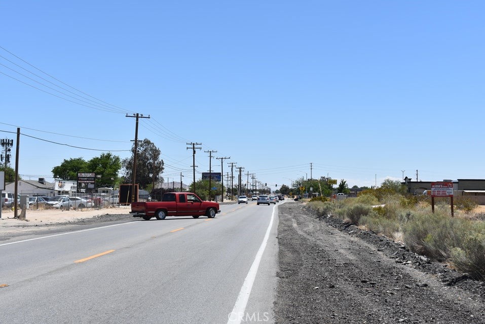 38.84 acre lot in the heart of the Sun Village area of Littlerock. The lot has 652 feet of paved frontage on Palmdale Blvd FROM 87th heading west and runs a half mile south to Ave R along Jackie Robinson Park . Zoned A21 for agriculture, animals. and a home. APN 3027-013-027.