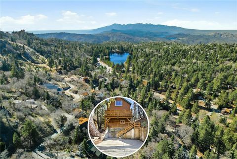 Photo of 33435 Falling Leaf Drive, Green Valley Lake, CA 92341 (MLS # IG26036192)