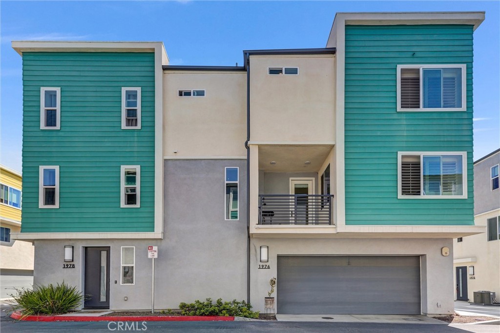 This beautiful contemporary condo nestled in the Millenia community of Otay Ranch is zoned for top rated schools that include Wolf Canyon Elementary (rated 8/10) and Olympian High School (rated 9/10) and SOLAR! There is a total 1,182 sq ft and 2 beds 2 1/2 baths in this tri-level home, with all your living space spread over two floors and the 1st floor having your foyer and 2 car garage access. The garage has 6 large over hanging storage racks to keep your garage well organized. The main level of the home has your open concept kitchen and living area along with half bath and access to your covered patio. The kitchen is light and bright with white shaker cabinetry and all stainless steel appliances including a water purification system under the sink! There is recessed lighting throughout the main floor along with an abundance of windows that bring in tons of natural light. All the windows throughout have upgraded wood plank shutters giving a seamless finish to the property. From the main level as you go up the stairwell to the 3rd floor you have two well sized bedrooms along with 2 full baths and your laundry. Located very close to shopping at Otay Ranch Town Center and not even a 2 minute walk to places like Sura Korean BBQ & Common Theory Public House at Metro Park. Otay Ranch is home to the Olympic Training Center for elite athletes along with tons of biking and walking trails near the Otay Lake.