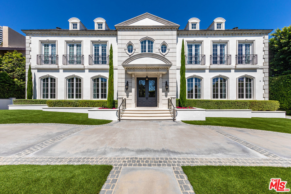 720 N. Alta is a classically styled European estate set on two-thirds of an acre in the coveted Beverly Hills Flats. This impeccably designed home is poised for exceptional indoor and outdoor entertaining and bordered by cyprus trees and tall hedges, adding to its exclusive, ultra-private atmosphere. The 7-bedroom, 14-bath home boasts sumptuous decorative details and amenities inside and out, from stunning vaulted ceilings, crown moldings and polished wood floors to an airy open-plan kitchen, home theater, fitness studio and wine cellar with attached tasting room. The manicured back lawn features an outdoor kitchen, lap pool, heated spa and fire pit. The home also boasts a garage with space for more than five vehicles and is equipped with a smart home technology system. 720 N. Alta is an impeccably designed find situated moments from the world-class shopping, dining and entertainment of the Sunset Strip, West Hollywood and Downtown Beverly Hills.