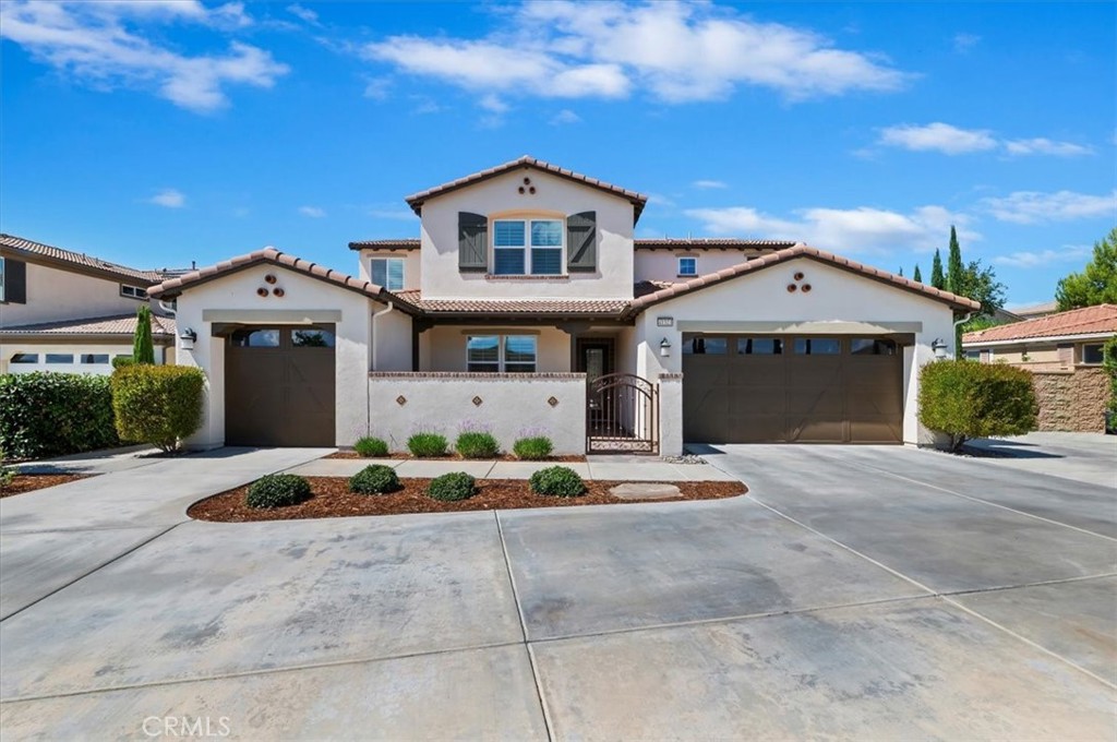 6 Bedrooms | 4.5 Bathrooms | 4,122 Sq Ft | Private Pool & Spa | 3-Car Garage | Solar | Separate Entrance Mother-in-Law Suite/Lennar NextGen Home. This Spanish-style home offers over 4,100 sq ft of beautifully designed living space with an open floor plan and chef’s kitchen, plus a separate entrance mother-in-law suite ideal for parents, adult children, long-term guests, or has previously been rented as a private suite. The suite lives like its own residence, featuring a full kitchen with gas stove, large laundry room with expansive storage, spacious bathroom with double vanity, an office with custom built-ins off the bedroom, walk-in closet, and its own patio and side yard, plus a private garage with direct access to the home. Situated at the end of a cul-de-sac on a HUGE 11,326 square foot private flag lot with an extended driveway for guest parking or convenient loading/unloading of recreational gear, this home is loaded with upgrades: beautiful hardwood floors throughout, a spacious upstairs loft, epoxy garage floors, a welcoming courtyard, and easy-care landscaping. The resort-style backyard features a 1-year-old salt water pool and spa with the latest Pentair equipment to keep costs low, built-in BBQ, with surround seating, gas firepit, 2 patio covers, outdoor TV, and solar for energy efficiency, plus 2 ac units and 2 tankless water heaters with boosters. Close to Temecula’s renowned wineries, premier shopping and dining, this home combines luxury, flexibility, and privacy—plus low HOA, low Mello-Roos, and low hazard insurance—in one of the city’s most sought-after neighborhoods, Belle Maison, with the best view of the hot air balloons.