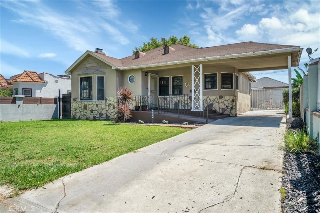 This beautifully updated 2-bedroom, 1-bath home offers a perfect blend of charm and modern style. Step into a bright, open living space with new flooring, recessed lighting, and a cozy fireplace that makes the space feel warm and inviting. The fully remodeled kitchen features quartz countertops, sleek cabinetry, and plenty of room for meal prep or entertaining. Both bedrooms are spacious with great natural light, and the bathroom has been tastefully updated with modern fixtures and finishes. The home also includes an indoor laundry area and thoughtful touches throughout that make it truly move-in ready. Whether you're a first-time buyer or just looking for a fresh, comfortable space to call home, this one checks all the boxes.