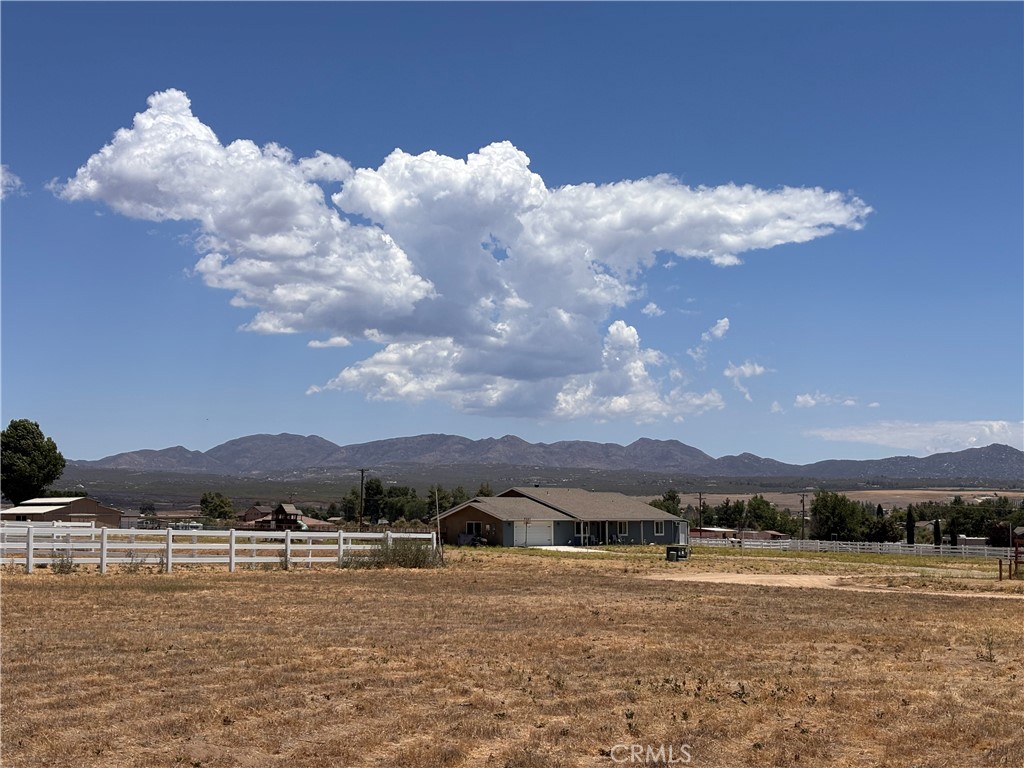 2.65 Acre Lot with beautiful VIEWS of the VALLEY AND MOUNTAINS. This property is an ALL FLAT and useable lot with a great PRODUCING WELL. 5 Horsepower well pumps at 35-40GPM. Well and septic perc tests are available upon request. It is a perfect place to build your DREAM HOME!
The land is ready to build on in this wonderful community of Lake Riverside Estates. 2.5 ACRES OR MORE for HOME SITES, so you have plenty of room for HORSES and other pets. The land is 20 minutes from Temecula, with Equestrian trails, a GATED COMMUNITY, 55 acre LAKE where fishing, paddle boarding and kayaking are allowed, and a 3500 LIGHTED PRIVATE AIRSTRIP. There is a COMMUNITY POOL, SPORTS COURTS AND AN ASSOCIATION MEETING CENTER. Let's not forget the frequent Farmer's Market nights to enjoy. They have a fire station in the community, public school, and Hamilton close by in Anza with K through 12th grade. Come and take a look at this amazing property! Certain lenders will loan on land. Electricity very close and low taxes!