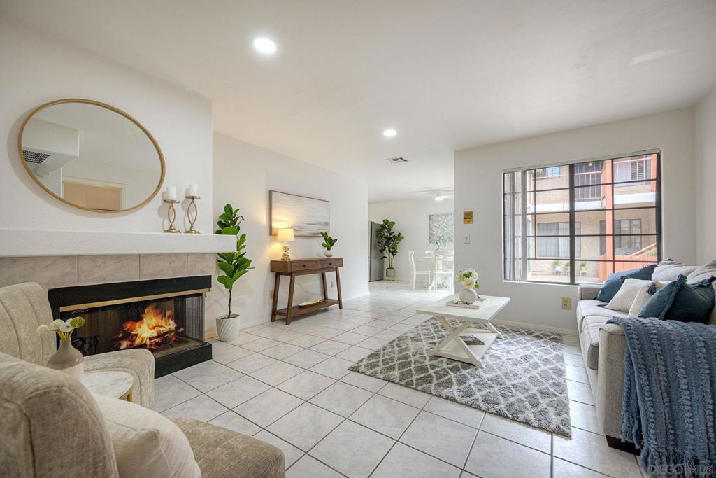 Dazzling fully renovated condo shines with a brand-new kitchen, sleek, modern baths, and the rare convenience of an attached garage with direct access to the unit. Outside your door, the neighborhood buzzes with energy—casual hangouts, trendy cafés, and a nightlife scene that never disappoints. By day, explore boutique shops, art galleries, and diverse restaurants; by night, catch live music in one-of-a-kind venues. This home offers the perfect mix of fresh, move-in ready comfort and a dynamic neighborhood lifestyle you’ll love.