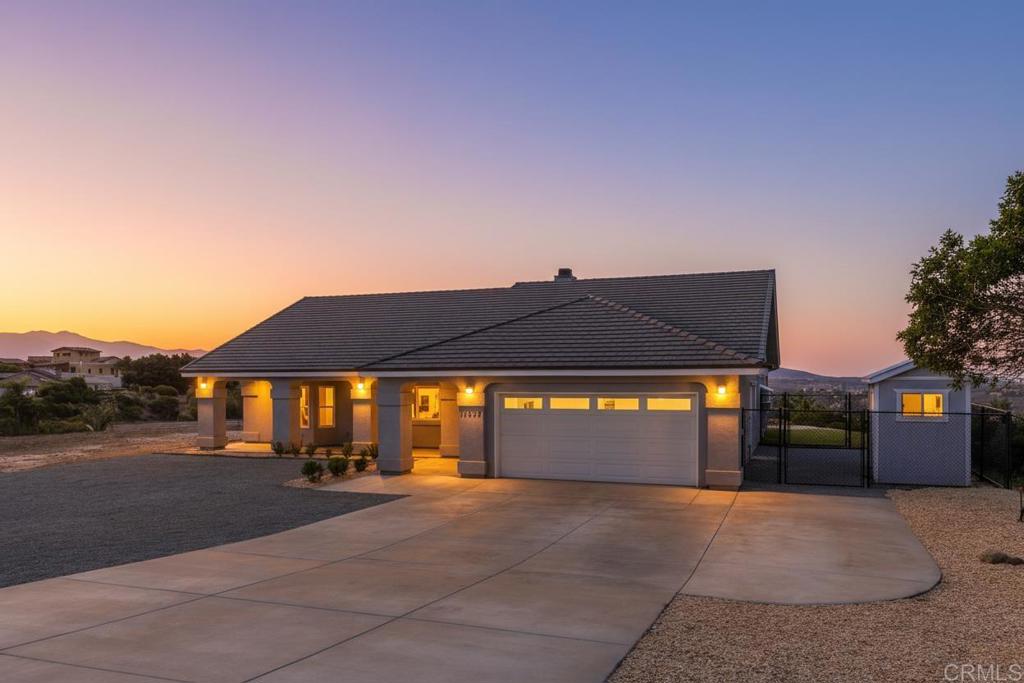 Coastal views and golden sunsets await! Perched on 2.8 usable acres with sweeping vistas stretching to the Coronado Islands, this single-story Jamul retreat offers both space and serenity just minutes from Rancho San Diego. Inside, open living is filled with natural light and seamless indoor-outdoor flow. French doors lead to a spacious patio where endless skies and brilliant sunsets become your nightly backdrop. The expansive primary suite with patio access creates a true retreat, while two additional oversized bedrooms provide flexibility for guests or a home office. The fully fenced property features low-maintenance landscaping, turf, hardscape, and plenty of usable land to bring your vision to life. Bonus highlights include a whole-house sound system, detached storage shed, and fresh epoxy garage floor. This is more than a home. It’s room to breathe, land to enjoy, and views that inspire every day.