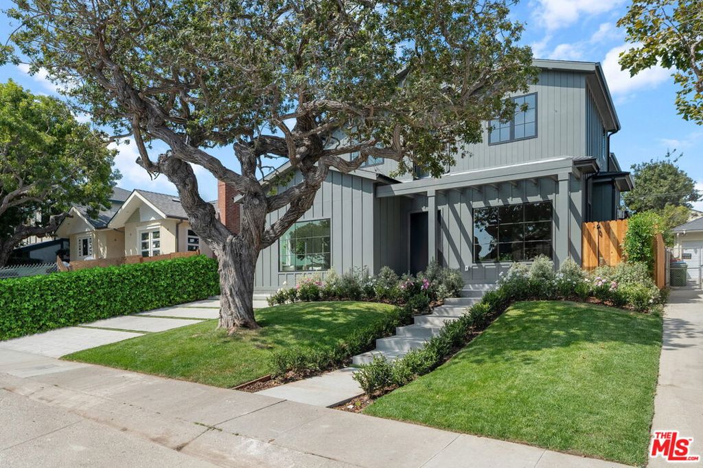 You will be inspired as you're welcomed into this stunning custom-built 5 Bdrm/5.5 Bath home! Built in 2025, this home blends immaculate design with the stunning warmth of being "home," which has a layout perfect for a growing family or for professionals who need at-home office space. The main floor features a formal living room , dining room w/ private patio, an expansive gourmet kitchen, and breakfast area with high-end finishes throughout; top-of-the-line SubZero/Wolf Appliances, an oversized island, and a built-in quartz table top-in the pantry, family room adjacent to the kitchen. This design is chic yet cozy and it opens out to the large yard as well as 1 en-suite bedroom on the main floor. Every bedroom is spacious and en-suite, and your primary bedroom features a large walk-in closet, fireplace, and a luxurious bathroom with a freestanding soaking tub. There is a beautiful 365 sqft ADU attached, included in the square footage, that allows you to live the SoCal dream, all while listening to your favorite playlist via indoor/outdoor control 4 sound system. With lush landscaping and your pool/spa, with an incredible water feature, escape the bustling city and soak up the serenity. No expense has been spared on this home, built by DiNali with exquisite finishes.
